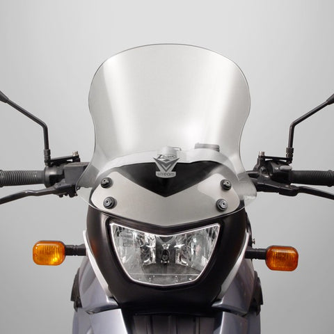The BMW F650GS G650GS Single Windscreen V-stream Windshield Ztechnik Z2412 Clear Sport Touring Screen 09-11 offers improved comfort and performance by giving a significant height and width increase, along with maximum impact or scratch protection for that added piece of mind. This windshield is made from 4.5mm hardcoated Lexan FMR polycarbonate sheet. It resists everyday scuffs and wears 100x better than the stock shield. And as well, it is optically transparent.