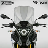 The BMW G310GS Windscreen V-stream Windshield Ztechnik Z2361 Light Tint Touring Screen 2017 Up offers improved comfort and performance by giving a significant height and width increase, along with maximum impact or scratch protection for that added piece of mind.   ZTechnik revolutionises windscreen performance with its VStream windshields. While creating a comfortable ride for the BMW sport touring rider, ZTechnik introduces quiet into the equation.