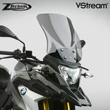 The BMW G310GS Windscreen V-stream Windshield Ztechnik Z2361 Light Tint Touring Screen 2017 Up offers improved comfort and performance by giving a significant height and width increase, along with maximum impact or scratch protection for that added piece of mind.   ZTechnik revolutionises windscreen performance with its VStream windshields. While creating a comfortable ride for the BMW sport touring rider, ZTechnik introduces quiet into the equation.