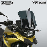 The BMW F750GS Windscreen V-stream Windshield ZTechnik Z2381 Dark Tint Sport Screen is an aggressive-looking adventure sport screen, and gives the F750GS rider good wind protection without sacrificing the bike's cutting edge appearance. The Sport screen simply offers V-Stream function and maximum impact or scratch protection for that added piece of mind, whilst maintaining a close-to-original size and sporty look.