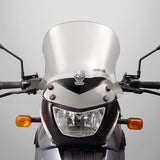 The BMW F650GS G650GS Single Windscreen V-stream Windshield Ztechnik Z2412 Clear Sport Touring Screen 09-11 offers improved comfort and performance by giving a significant height and width increase, along with maximum impact or scratch protection for that added piece of mind.  This windshield is made from 4.5mm hardcoated Lexan FMR polycarbonate sheet. It resists everyday scuffs and wears 100x better than the stock shield. And as well, it is optically transparent.